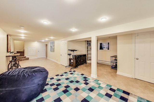 6167 N Naper Ave, Chicago, IL 60631 - finished basement with baseboard heating, light tile patterned floors, stairs, and baseboards