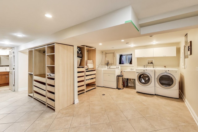 6167 N Naper Ave, Chicago, IL 60631 - washroom featuring independent washer and dryer, light tile patterned floors, recessed lighting, cabinet space, and baseboards