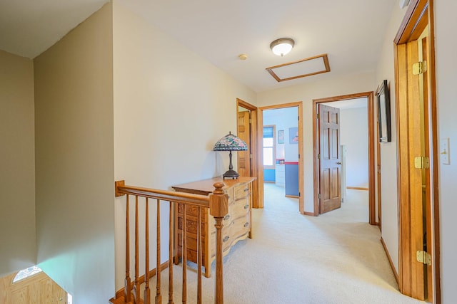 43 Mohawk St, Cary, IL 60013 - hall with an upstairs landing, light colored carpet, and attic access