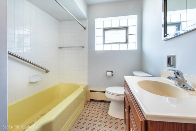 full bathroom featuring a baseboard heating unit, toilet, vanity, and tub / shower combination