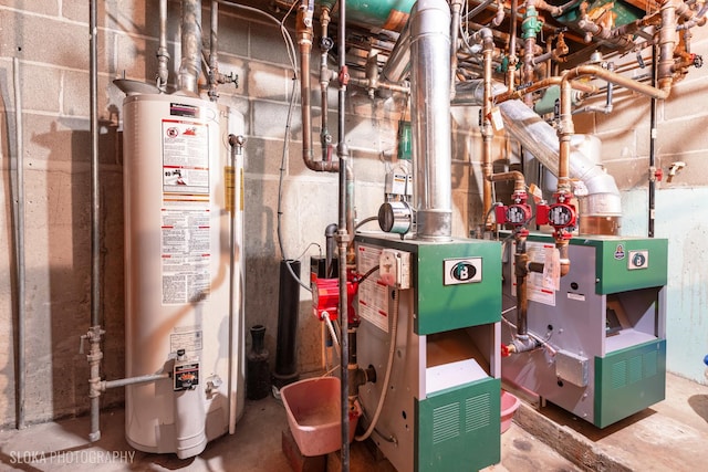 utility room with water heater and a heating unit