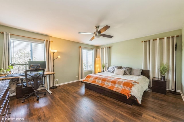 2140 Colchester Ave, Hoffman Estates, IL 60192 - bedroom with multiple windows, a desk, wood finished floors, and baseboards