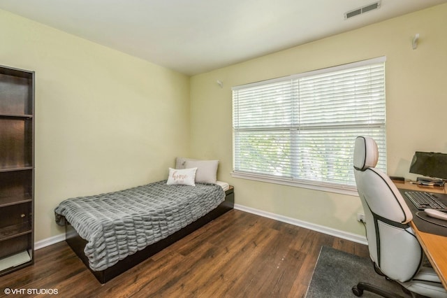2140 Colchester Ave, Hoffman Estates, IL 60192 - bedroom with a desk, wood finished floors, and baseboards