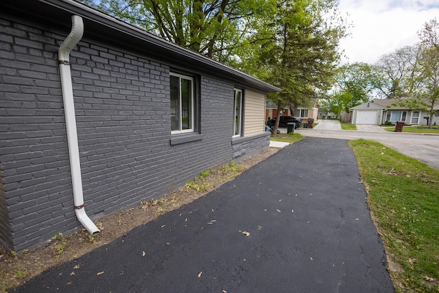 239 Marquette St, Park Forest, IL 60466 - view of side of home featuring brick siding