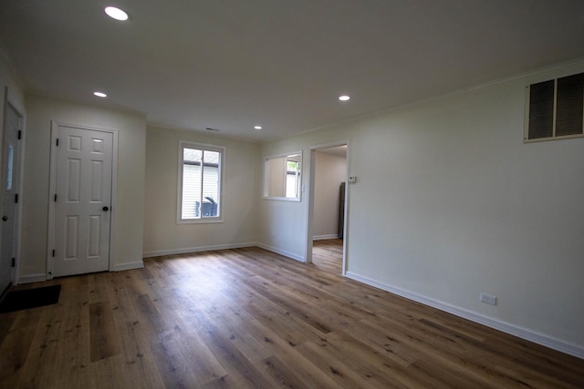239 Marquette St, Park Forest, IL 60466 - spare room featuring baseboards, recessed lighting, and wood finished floors