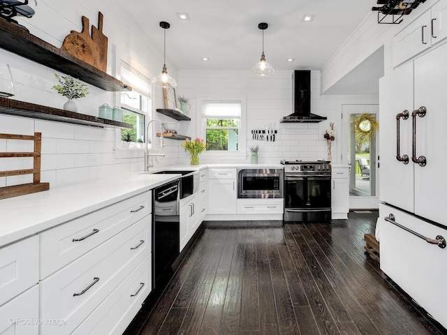 733 S Naperville Rd, Wheaton, IL 60189 - kitchen featuring open shelves, stainless steel appliances, wall chimney exhaust hood, decorative backsplash, and recessed lighting