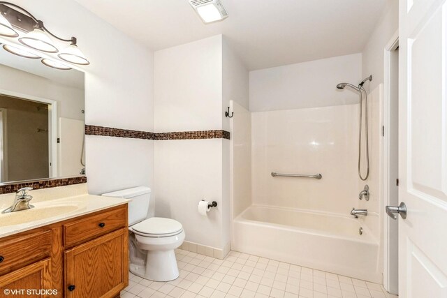 9355 W Irving Park Rd Unit 120, Schiller Park, IL 60176 - full bathroom featuring tile patterned flooring, toilet, vanity, shower / bathtub combination, and baseboards
