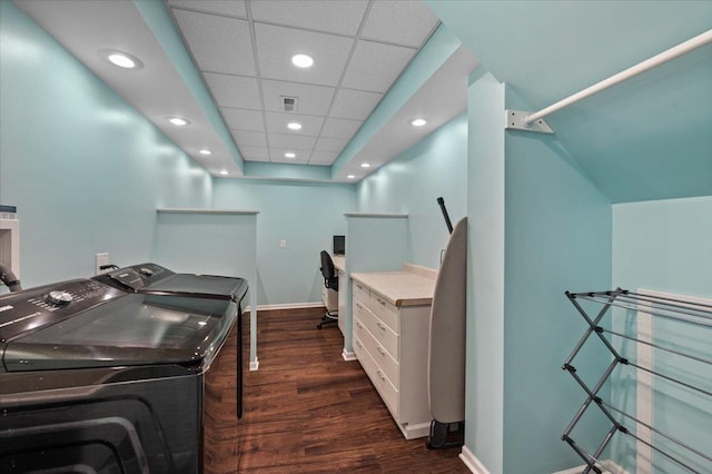 clothes washing area with independent washer and dryer, baseboards, dark wood-style flooring, and recessed lighting