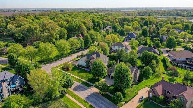 aerial view of residential area with a forest