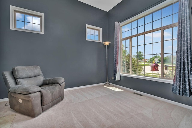 203 Jefferson St, Manteno, IL 60950 - sitting room with carpet floors, baseboards, and healthy amount of natural light