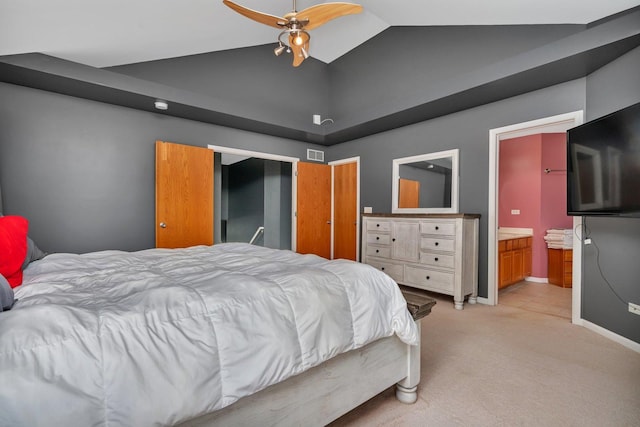 203 Jefferson St, Manteno, IL 60950 - bedroom with light colored carpet, ensuite bathroom, high vaulted ceiling, baseboards, and a ceiling fan