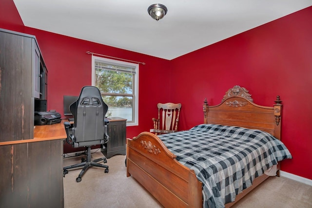 203 Jefferson St, Manteno, IL 60950 - bedroom with light carpet, a desk, and baseboards