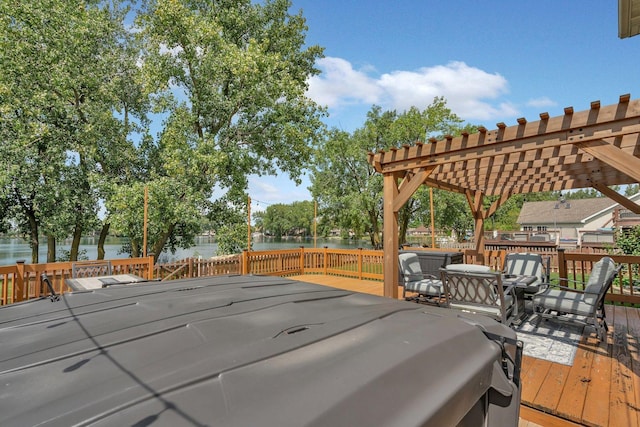 203 Jefferson St, Manteno, IL 60950 - deck featuring a water view, a pergola, and a hot tub