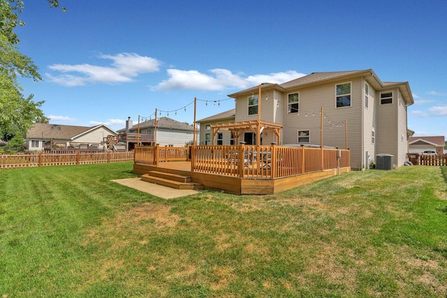 203 Jefferson St, Manteno, IL 60950 - back of house with central AC unit and a wooden deck