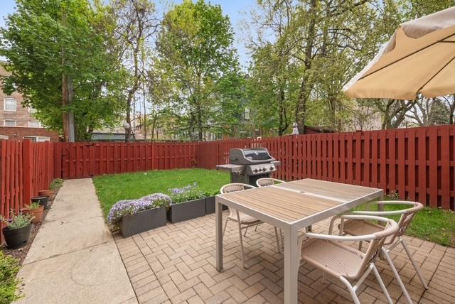 5135 S Kimbark Ave, Chicago, IL 60615 - view of patio / terrace featuring area for grilling and outdoor dining area
