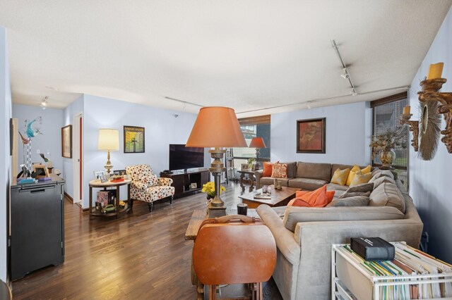 70 W Huron St Unit 708, Chicago, IL 60654 - living area with track lighting and dark wood-style floors