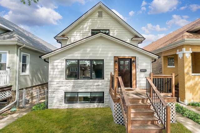 2705 Cuyler Ave, Berwyn, IL 60402 - view of front of home featuring a front lawn and a gate