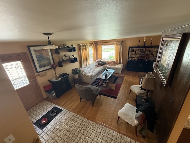 8325 W Maple Ave, Norridge, IL 60706 - living area featuring wood finished floors and a textured ceiling