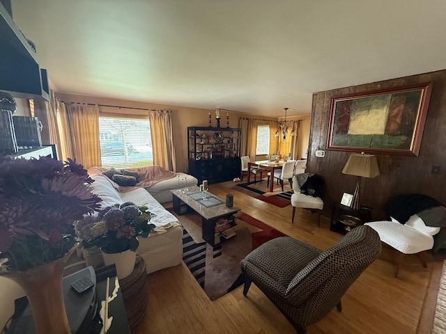 8325 W Maple Ave, Norridge, IL 60706 - living room featuring a chandelier and wood finished floors