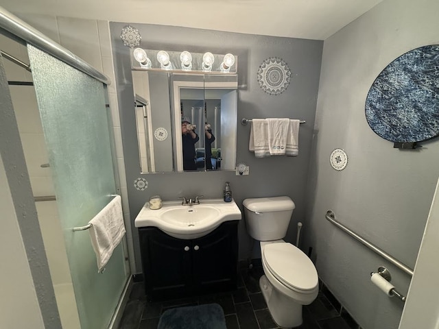 8325 W Maple Ave, Norridge, IL 60706 - full bathroom featuring toilet, vanity, a stall shower, and tile patterned flooring