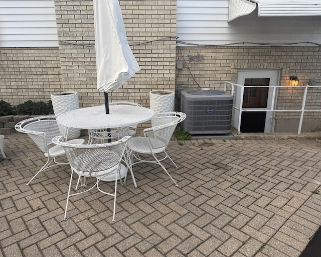 8325 W Maple Ave, Norridge, IL 60706 - view of patio featuring cooling unit and outdoor dining area