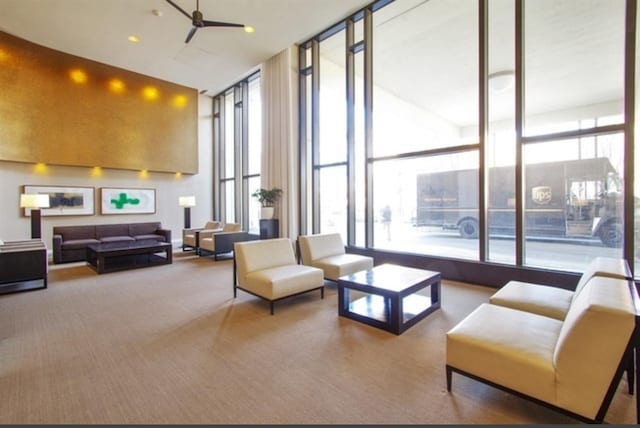 3930 N Pine Grove Ave Unit 1703, Chicago, IL 60613 - community lobby with floor to ceiling windows and a high ceiling