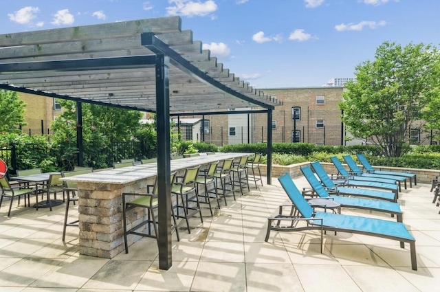 3930 N Pine Grove Ave Unit 1703, Chicago, IL 60613 - view of property's community featuring a pergola and a patio area