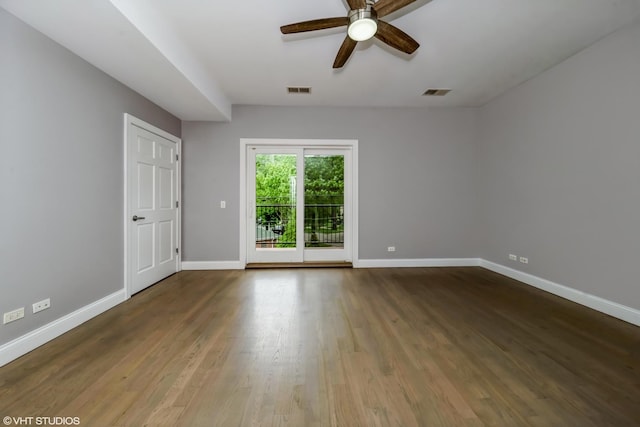 6436 N Lehigh Ave Unit 2N, Chicago, IL 60646 - spare room with a ceiling fan, wood finished floors, and baseboards