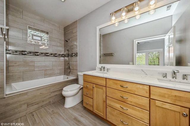6436 N Lehigh Ave Unit 2N, Chicago, IL 60646 - bathroom with double vanity, tiled shower / bath, and toilet