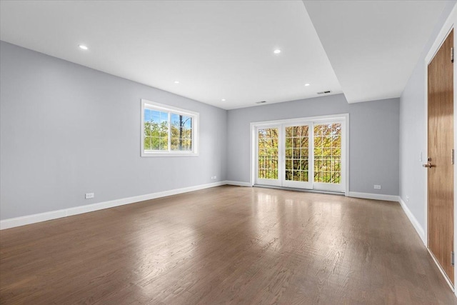 6436 N Lehigh Ave Unit 2N, Chicago, IL 60646 - empty room with wood finished floors, baseboards, and recessed lighting
