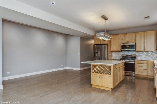 6436 N Lehigh Ave Unit 2N, Chicago, IL 60646 - kitchen with appliances with stainless steel finishes, baseboards, light countertops, backsplash, and dark wood-type flooring
