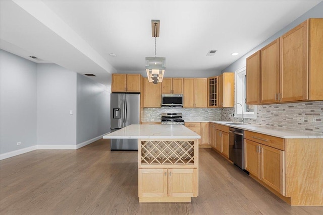 6436 N Lehigh Ave Unit 2N, Chicago, IL 60646 - kitchen with appliances with stainless steel finishes, light wood-style floors, tasteful backsplash, and recessed lighting