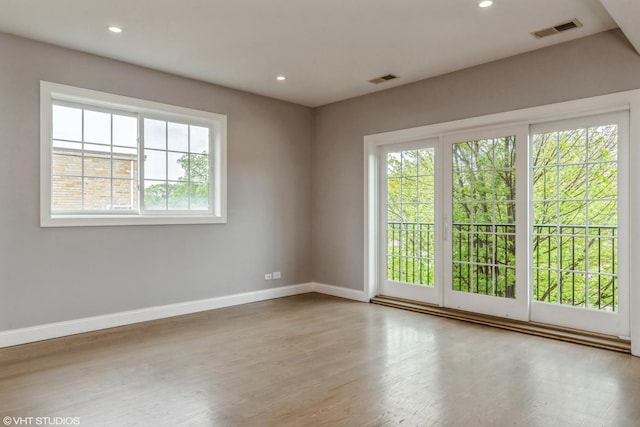 6436 N Lehigh Ave Unit 2N, Chicago, IL 60646 - unfurnished room featuring baseboards, wood finished floors, and recessed lighting
