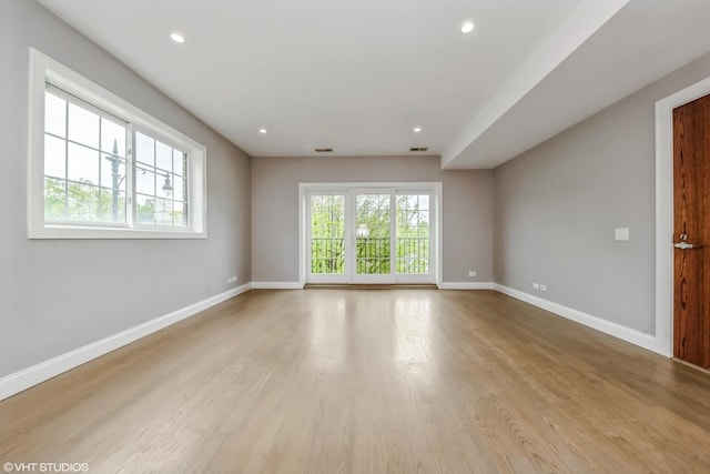 6436 N Lehigh Ave Unit 2N, Chicago, IL 60646 - empty room featuring baseboards, wood finished floors, and recessed lighting