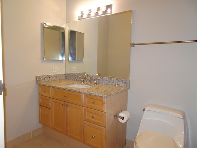 512 N Mcclurg Ct Unit 4904, Chicago, IL 60611 - bathroom featuring vanity, toilet, tile patterned flooring, and baseboards