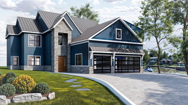 39457 N Forest Ave, Antioch, IL 60002 - view of front facade with stone siding, a standing seam roof, metal roof, driveway, and a front yard