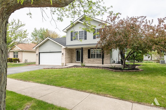 traditional-style home with brick siding, a garage, driveway, a porch, and a front yard