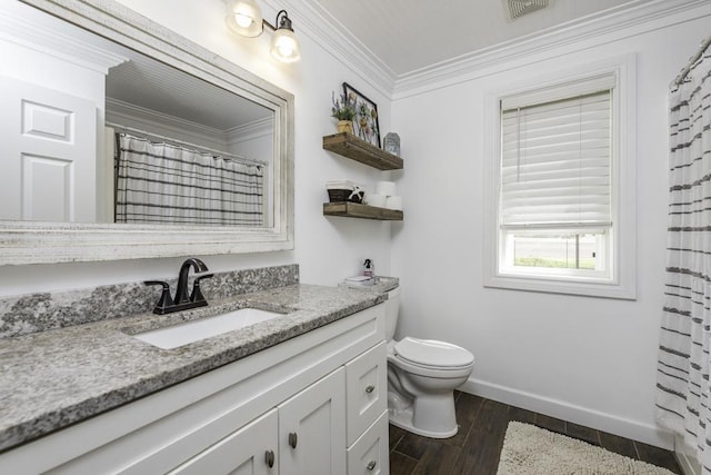 full bath featuring vanity, toilet, ornamental molding, baseboards, and wood finished floors