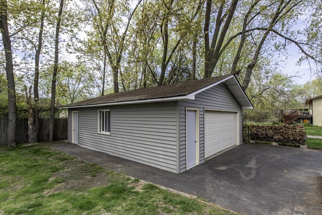 detached garage with fence