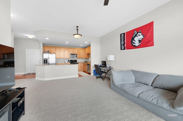 living room with light carpet, recessed lighting, and baseboards