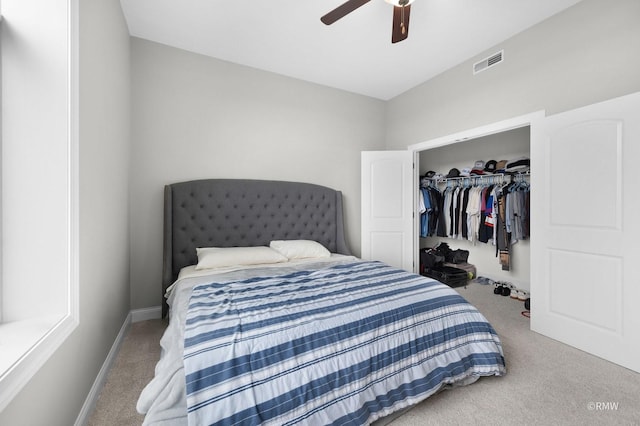 bedroom featuring carpet, a closet, baseboards, and ceiling fan