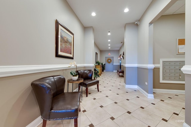 corridor featuring recessed lighting and baseboards