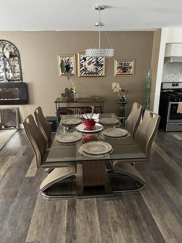 18650 Golfview Dr, Hazel Crest, IL 60429 - dining room featuring wood finished floors and a chandelier