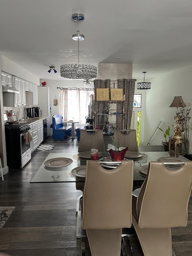 18650 Golfview Dr, Hazel Crest, IL 60429 - dining area featuring dark wood-style floors and a chandelier