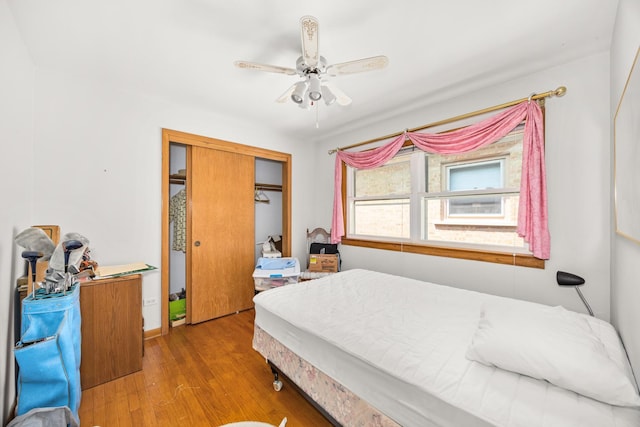 3707 Clarence Ave, Berwyn, IL 60402 - bedroom featuring wood finished floors, a closet, and ceiling fan