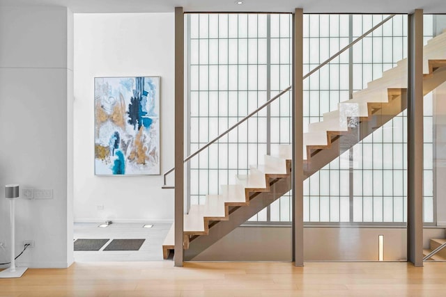 824 Humboldt Ave, Winnetka, IL 60093 - staircase featuring wood finished floors and baseboards