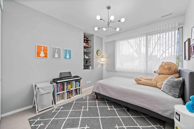 824 Humboldt Ave, Winnetka, IL 60093 - bedroom featuring a chandelier, multiple windows, and baseboards