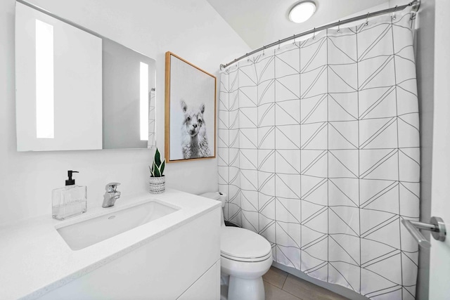 824 Humboldt Ave, Winnetka, IL 60093 - bathroom featuring toilet, vanity, a shower with curtain, and tile patterned floors