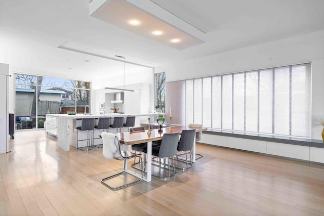 824 Humboldt Ave, Winnetka, IL 60093 - dining area with light wood-style floors and recessed lighting