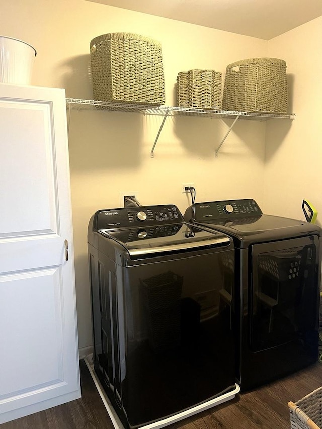 173 Willowwood Dr N, Oswego, IL 60543 - clothes washing area with independent washer and dryer and dark wood-style floors